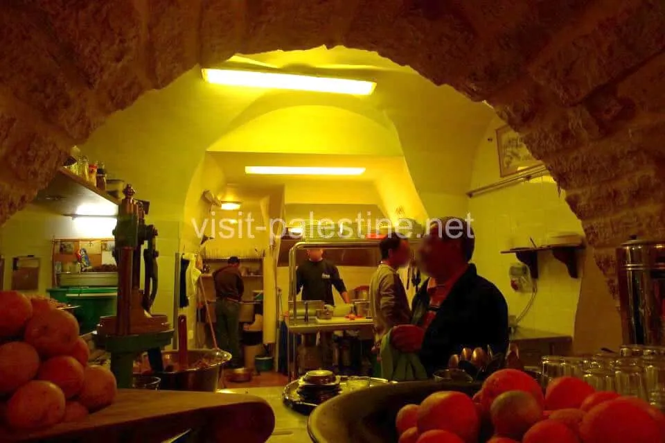 Their kitchen is always busy. Even fruit juices are freshly made for each order. Falafel restaurant Afteem kitchen, Bethlehem