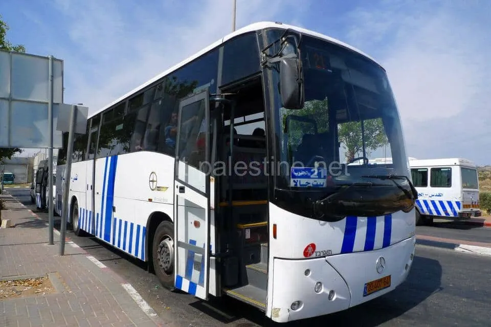 The buses are waiting in front of the exit of the checkpoint. Buses at checkpoint entrance to Bethlehem