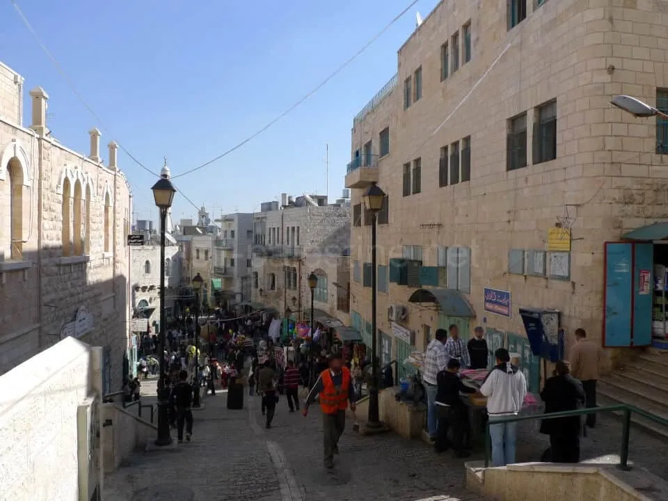 The Main street in Bethlehem: If you don’t see the wall or the checkpoints, it looks like an ordinary town. Bethlehem main street on a fine day