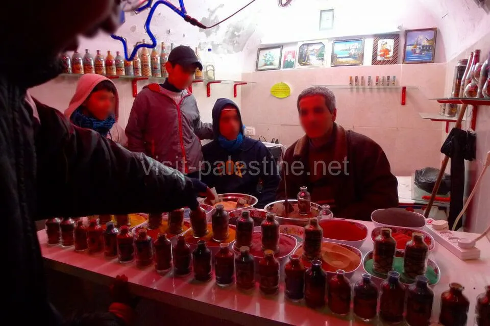 Original sand art products shop in Hebron Old City. Interesting to find Palestinian-original motifs in the bottles. The Old City, sand art shop in Hebron