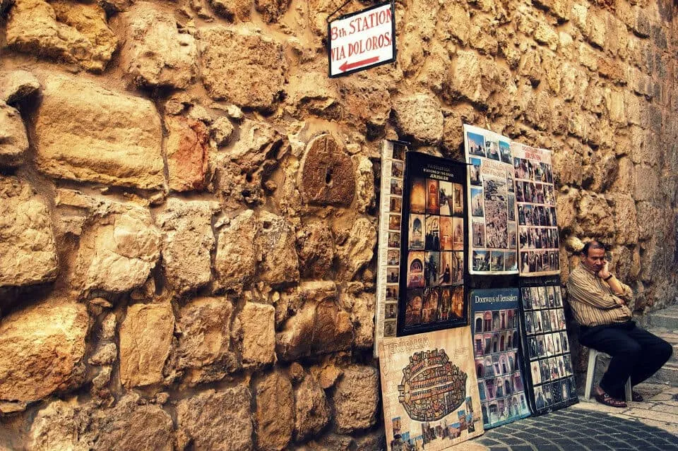 There is an embedded stone marking IC XC NIKA, which means Jesus Christ conquers. momo Jerusalem Via Dolorosa the 8th station