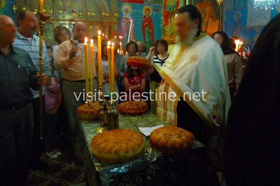At the mess, people offer big bread baked with the special mold of Saint George. The Church of St. George, Palestine