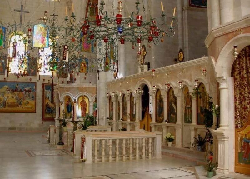 The altar and the stairs to the well. Seetheholyland.net The inside of the church of St. Photini, Nablus