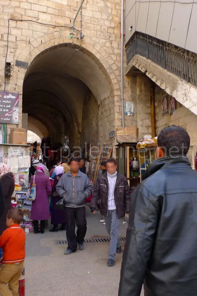 The entrance gate to the Old City. There is Turkish style bathroom inside this gate. No toilet paper. The entrance to the Old City, Nablus