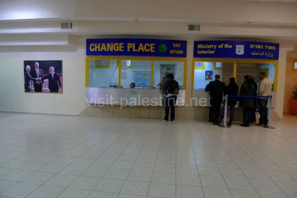 Small counter for paying a service fee and currency exchange. Currency exchange office at the Israeli border to Jordan